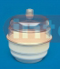 Moulded, crystal clear, top made of polycarbonate and bottom made out of chemical resistant polypropylene. Grease is required on the flanges to make the dessicator airtight.